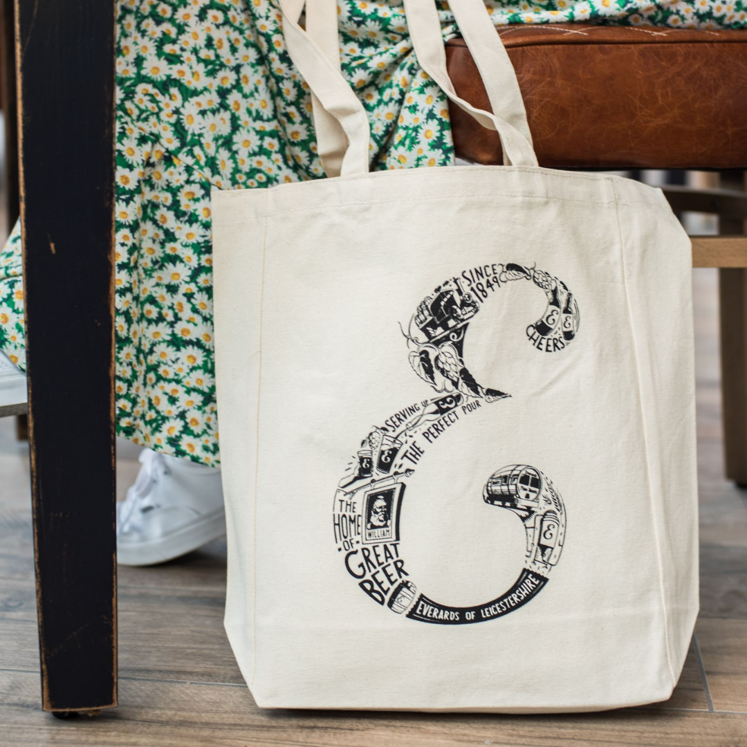 E tote shopper bag on ground by feet